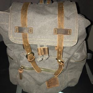 Canvas and leather straps backpack
